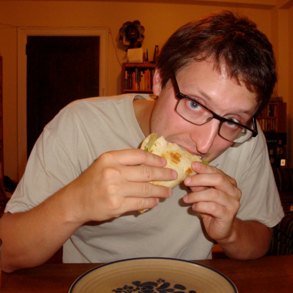 Glenn Eating a Pita